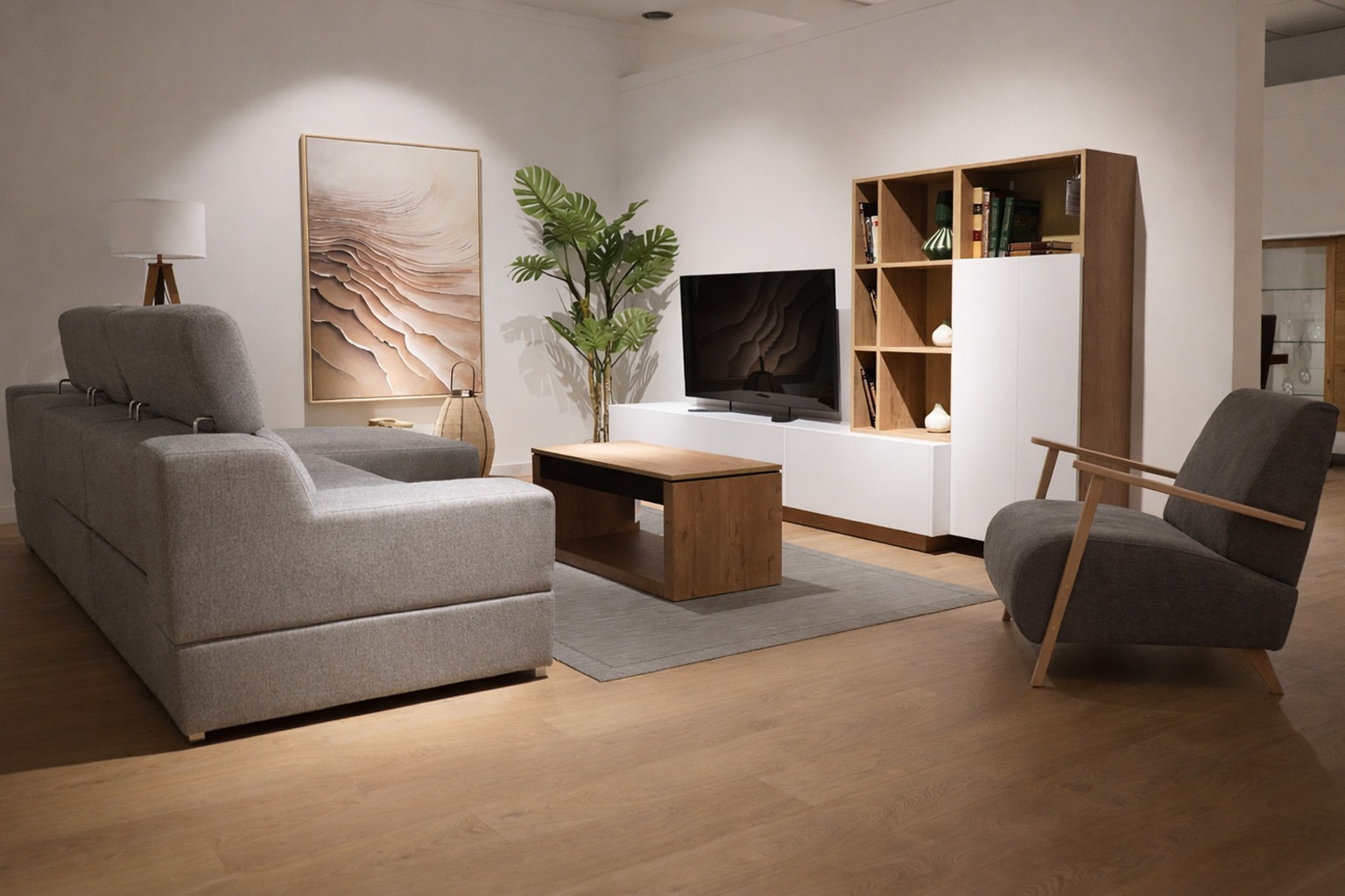 Salón moderno con mueble TV blanco y sofá gris Salón moderno con sofá gris, mueble TV blanco y mesa de centro de madera
